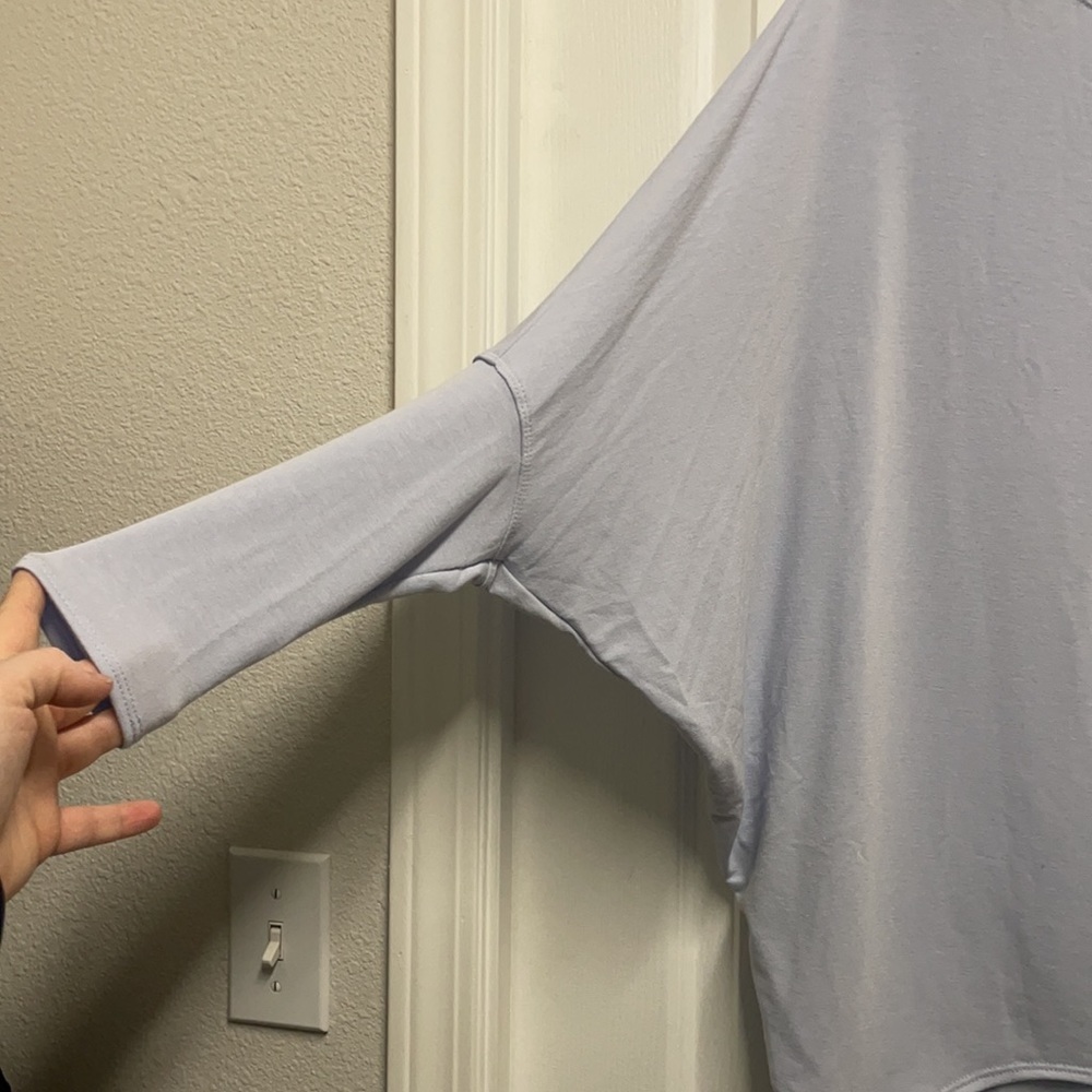 Light blue top. - Picture 3 of 4